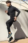 man-athletic-wear-posing-stairs-outdoors
